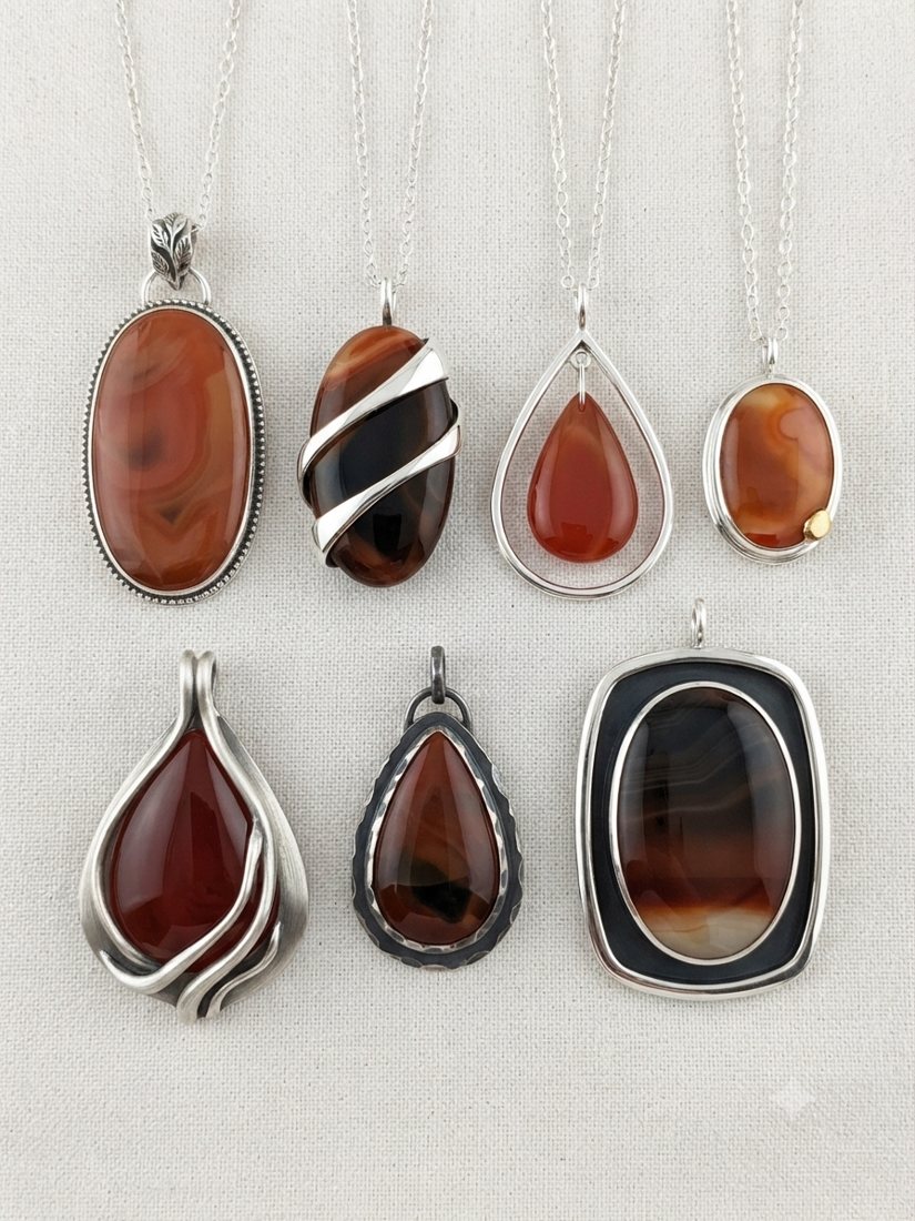 Carnelian & Banded Agate Pendants, Red-orange carnelian and banded agate; teardrop, oval and wrapped settings