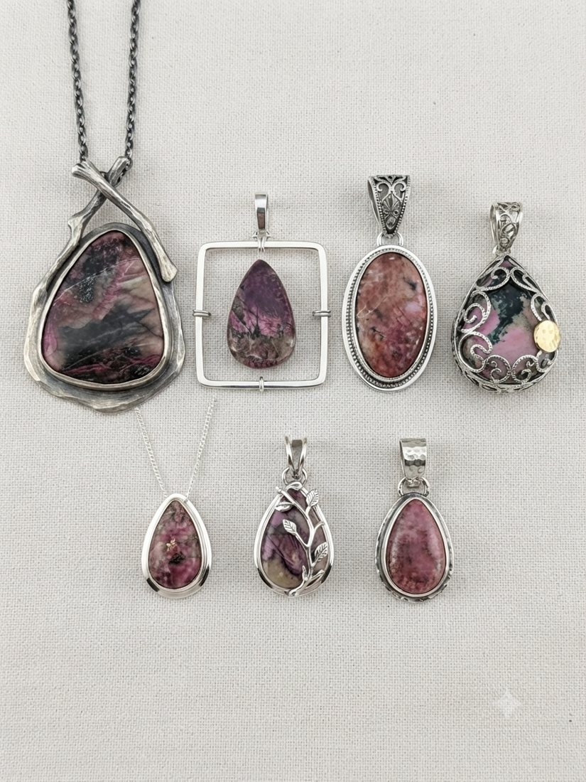 Charoite & Pink Stone Pendants, Purple charoite and pink-purple stones with black veining