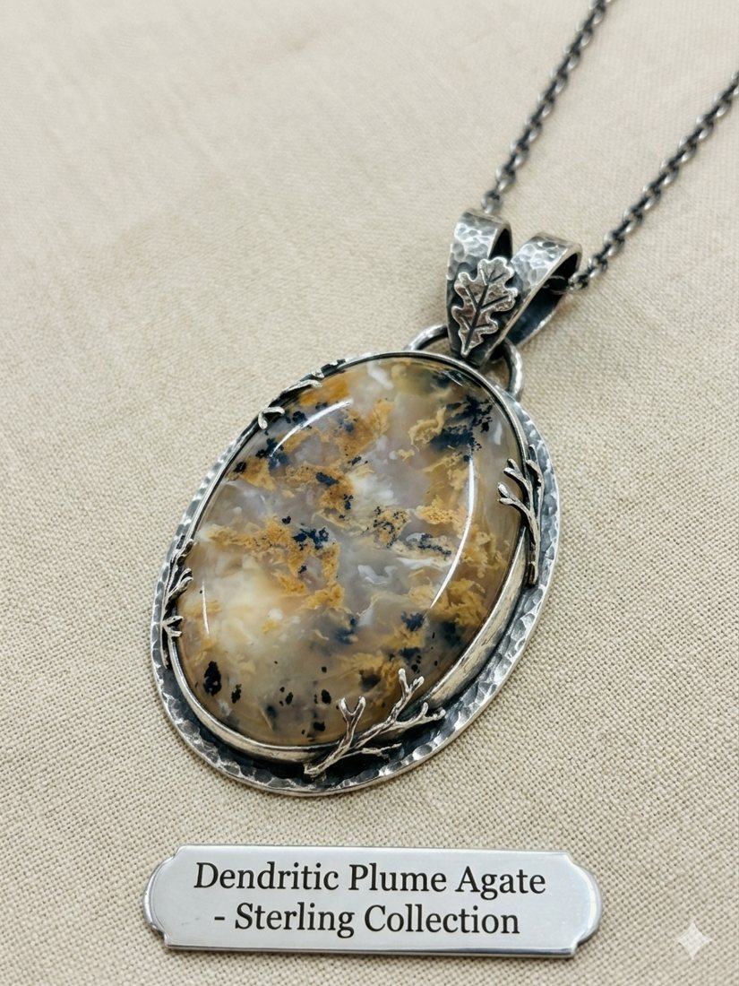 Dendritic Plume Agate Pendant, Plume agate with golden-brown dendrites in a leaf-detail setting