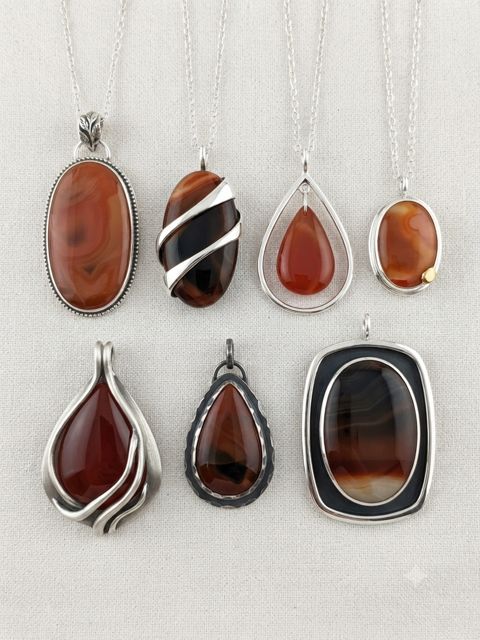 Carnelian & Banded Agate Pendants, Red-orange carnelian and banded agate; teardrop, oval and wrapped settings