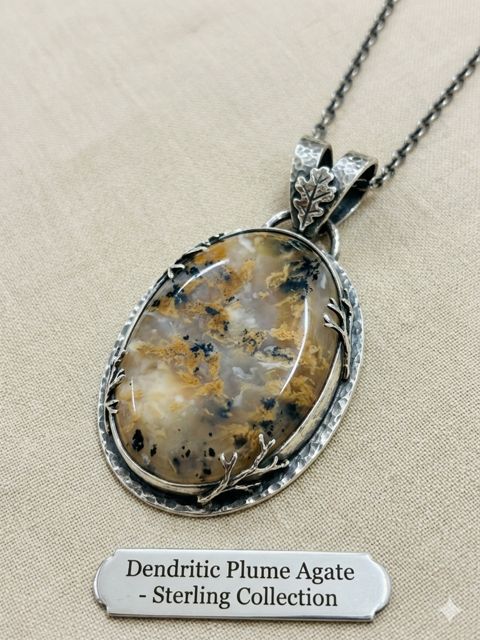 Dendritic Plume Agate Pendant, Plume agate with golden-brown dendrites in a leaf-detail setting